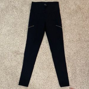 Black athleta leggings with zipper on both legs